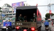 A vehicle transports soldiers amid the coronavirus disease (Covid-19) outbreak in Ho Chi Minh city, Vietnam August 20, 2021. Reuters/Stringer 