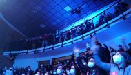 Vaccinated Chileans enjoy the Chancho en Piedra band during a concert as part of a study of the Hospital Clinico de la Universidad de Chile (Clinical Hospital of the University of Chile) for the coronavirus disease (COVID-19) pandemic, in Santiago, Chile,