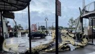 The roof of a building next to Jax Brewery lies on the ground after it was blown off due to strong winds from Hurricane Ida in New Orleans, Louisiana, U.S., August 30, 2021. REUTERS/Devika Krishna Kumar
