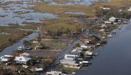 A view shows debris and buildings damaged from Hurricane Ida as U.S. President Joe Biden (not pictured) inspects the damage from Hurricane Ida from aboard the Marine One helicopter during an aerial tour of communities in Laffite, Grand Isle, Port Fourchon