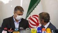 Head of Iran's Atomic Energy Organization Mohammad Eslami and International Atomic Energy Agency (IAEA) Director General Rafael Grossi attend a news conference, in Tehran, Iran, September 12, 2021. 