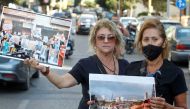 Family members of some of the victims of last year's Beirut port blast, hold pictures ahead of a parliament meeting near UNESCO Palace in Beirut, Lebanon, August 12, 2021. Reuters/Aziz Taher/File Photo