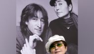 FILE PHOTO: Yoko Ono, the wife of the late singer John Lennon, listens to reporters' questions in front of a portrait of Lennon and herself at a news conference in Tokyo October 4, 2005. REUTERS/Toru Hanai/File Photo
