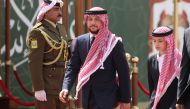 FILE PHOTO: Jordan's Crown Prince Hussein and his brother Prince Hashem attend a ceremony celebrating the country's 73rd Independence Day in Amman, Jordan, May 25, 2019. REUTERS/Muhammad Hamed/File Photo
