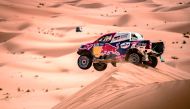Qatar's Nasser Al Attiyah and navigator Mathieu Baumel in action during the third stage of Rally of Morocco, yesterday.
