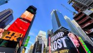 A billboard showing former U.S. President Donald Trump is seen in Times Square in the Manhattan borough of New York on October 14, 2021. (REUTERS/Eduardo Munoz)