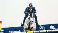 Mohammed Saeed Haidan guides Miss Chili over a hurdle.