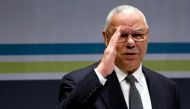 Former U.S. Secretary of State Colin Powell salutes the audience as he takes the stage at the Washington Ideas Forum in Washington, September 30, 2015. REUTERS/Jonathan Ernst/File Photo