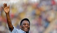 Legendary Brazilian soccer player Pele waves to the spectators before the start of under-17 boys' final soccer match of Subroto Cup tournament at Ambedkar stadium in New Delhi, India, October 16, 2015. REUTERS/Anindito Mukherjee/File Photo