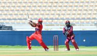 Bahrain's Muhammad Younis plays a shot as Qatar's wicketkeeper Mohammed Rizlan looks on. Pictures: Abdul Basit / The Peninsula 