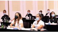 Women's referees attend the workshop.