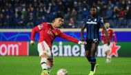 Manchester United's Cristiano Ronaldo scores their second goal REUTERS/Alberto Lingria
