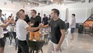Al Sadd's Santi Cazorla greets Xavi during a farewell event at Al Sadd Club yesterday.