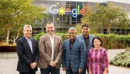 Indosat Ooredoo and Google officials pose for a group photo.