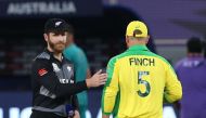 New Zealand captain Kane Williamson with Australia captain Aaron Finch before the match REUTERS/Satish Kumar
