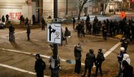 Protesters gather outside the Justice Center after the full acquittal verdict of teenager Kyle Rittenhouse in his Wisconsin fatal shootings trial, in Portland, Oregon, U.S. November 19, 2021. Reuters/John Rudoff 