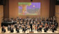 Alastair Wills conducting 'Winter Wonderland' at a concert organised by the Qatar Philharmonic Orchestra at the Qatar National Convention Centre.  Pic: Salim Matramkot/The Peninsula