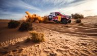 Nasser Al Attiyah and Mathieu Baumel drive their Toyota Hilux during the shakedown in Hail, Saudi Arabia, yesterday.