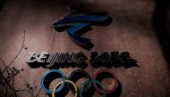 Beijing 2022 logo seen outside the headquarters of the Beijing Organising Committee for the 2022 Olympic and Paralympic Winter Games in Shougang Park in Beijing, China. Reuters/Thomas Peter/File Photo