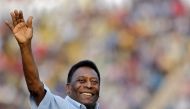 Legendary Brazilian soccer player Pele waves to the spectators before the start of under-17 boys' final soccer match of Subroto Cup tournament at Ambedkar stadium in New Delhi, India, October 16, 2015. REUTERS/Anindito Mukherjee

