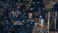 Businesses are seen destroyed in the aftermath of a tornado in Mayfield, Kentucky, U.S. December 12, 2021. Picture taken with a drone. REUTERS/Adrees Latif
