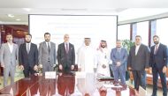 Ibrahim Jassim Al Othman, President, CEO and Member of the Board at UDC, Oktay Ercan, Chairman of Ruzgar Healthcare Holding, and other officials, during the agreement signing ceremony.  