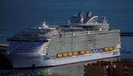 FILE PHOTO: A view of the world's largest cruise ship of Royal Caribbean Cruises, the 362-metre-long Symphony of the Seas, during its world presentation ceremony, berthed at a port in Malaga, Spain March 27, 2018. REUTERS/Jon Nazca/File Photo
