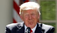FILE PHOTO: U.S. President Donald Trump pauses as he announces his decision that the United States will withdraw from the landmark Paris Climate Agreement, in the Rose Garden of the White House in Washington, U.S., June 1, 2017. REUTERS/Kevin Lamarque/File Photo
