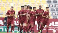 Al Sadd players celebrate.