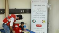 A child receiving treatment under QRCS medial programme in Iraq.