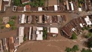 An aerial view shows flooded streets, caused due to heavy rains, in Itajuipe, Bahia state, Brazil December 27, 2021. Picture taken with a drone. REUTERS/Amanda Perobelli
