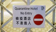 FILE PHOTO: A sign is seen inside a quarantine hotel, during the coronavirus disease (COVID-19) pandemic, in Hong Kong, China August 30, 2021. Picture August 30, 2021.REUTERS/Tyrone Siu/File Photo
