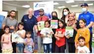 A file photo shows FIFA President Gianni Infantino, Secretary-General of the Supreme Committee for Delivery & Legacy Hassan Al Thawadi, and others at a Generation Amazing activity for children evacuated from Afghanistan. 