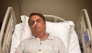 Brazil's President Jair Bolsonaro gestures while being hospitalized due to an intestinal blockage in Sao Paulo, Brazil January 3, 2022 in this picture obtained from social media. @jairbolsonaro via Twitter/via REUTERS