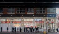 FILE PHOTO: People queue for a coronavirus disease (COVID-19) test at a City MD Urgent Care as the Omicron coronavirus variant continues to spread in the Queens borough of New York City, U.S., December 23, 2021. REUTERS/Jeenah Moon/File Photo
