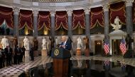 U.S. President Joe Biden speaks in Statuary Hall on the first anniversary of the January 6, 2021 attack on the U.S. Capitol by supporters of former President Donald Trump, on Capitol Hill in Washington, U.S., January 6, 2022. REUTERS.