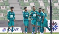 Al Ahli players celebrate after defeating Umm Salal.