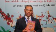 Indonesian Ambassador Ridwan Hassan holding the book Mutiara Inspirasi dari Qatar.PICS: SALIM MATRAMKOT/THE PENINSULA