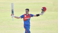 Afghanistan’s Rahmanullah Gurbaz celebrates after scoring his century, yesterday. PIC: ACB MEDIA
