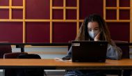 FILE PHOTO: A girl works during study hall Parkland High School in Allentown, Pennsylvania, U.S. April 13, 2021. Picture taken April 13, 2021. REUTERS/Hannah Beier/File Photo
