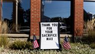 A sign placed in honor of Navy Corpsman Max Soviak, one of 13 U.S. service members killed in the airport suicide bombing in Afghanistan's capital Kabul, in his hometown of Berlin Heights, Ohio, U.S., September 8, 2021. Reuters/Megan Jelinger/File Photo