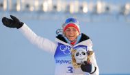 Gold medalist, Therese Johaug of Norway, celebrates after winning. Reuters/Marko Djurica