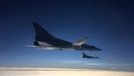 A view shows two Russian long-range strategic bombers Tu-22M3 during joint military exercises with Belarusian Air Forces in Belarusian air space, in this handout photo released February 5, 2022. Belarusian Defence Ministry