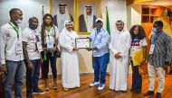 Ambassador of Qatar to Nigeria H E Dr. Ali bin Ghanem Al Hajri receiving the honorary certificate.
