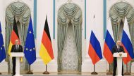 Russian President Vladimir Putin and German Chancellor Olaf Scholz attend a joint news conference in Moscow, Russia February 15, 2022. Sputnik/Sergey Guneev/Kremlin via REUTERS.