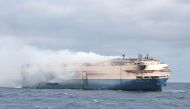 FILE PHOTO: The ship, Felicity Ace, which was traveling from Emden, Germany, where Volkswagen has a factory, to Davisville, in the U.S. state of Rhode Island, burns more than 100 km from the Azores islands, Portugal, February 18, 2022. Portuguese Navy (Marinha Portuguesa)/Handout via REUTERS 