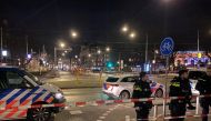 Dutch police is seen near an Apple store in central Amsterdam during a hostage incident in the store, in Amsterdam, Netherlands February 22, 2022. REUTERS/Toby Sterling
