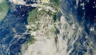 A satellite image shows Cyclone Emnati over Madagascar, February 23, 2022. Courtesy of European Union, Copernicus Sentinel-3. Imagery processed by @DEFIS_EU/Handout via REUTERS