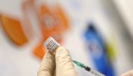 FILE PHOTO: Doses of the Pfizer-BioNTech vaccine against the coronavirus disease (COVID-19) for children are prepared at a children doctor's practice in Maintal near Frankfurt, Germany, December 15, 2021. REUTERS/Kai Pfaffenbach/File Photo
