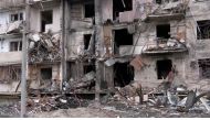 Screengrab from video shows a heavily damaged apartment building after overnight rocket attacks by Russian forces on the country's capital Kyiv, Ukraine February 25, 2022. Reuters TV via REUTERS
